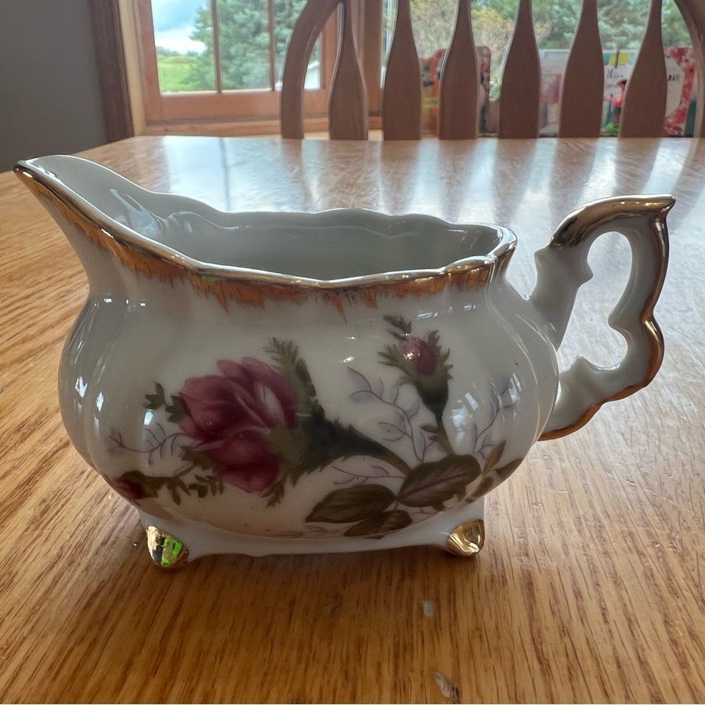 Dainty elegant antique mini creamer moss rose pattern and brush gold trim.
